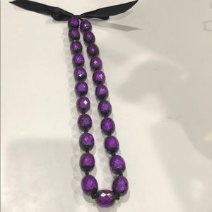 Large purple bead necklace and earrings